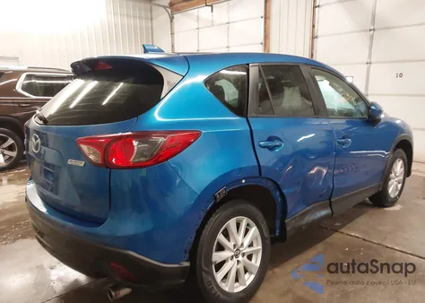 2014 Mazda Cx-5 Touring z USA, uszkodzony, nr VIN JM3KE2CY2E0374650